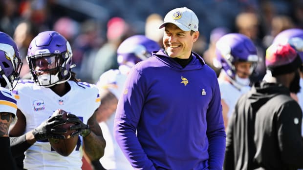 Oct 15, 2023; Chicago, Illinois, USA; Minnesota Vikings head coach Kevin O'Connell watches his team warm up before a game against the Chicago Bears at Soldier Field.